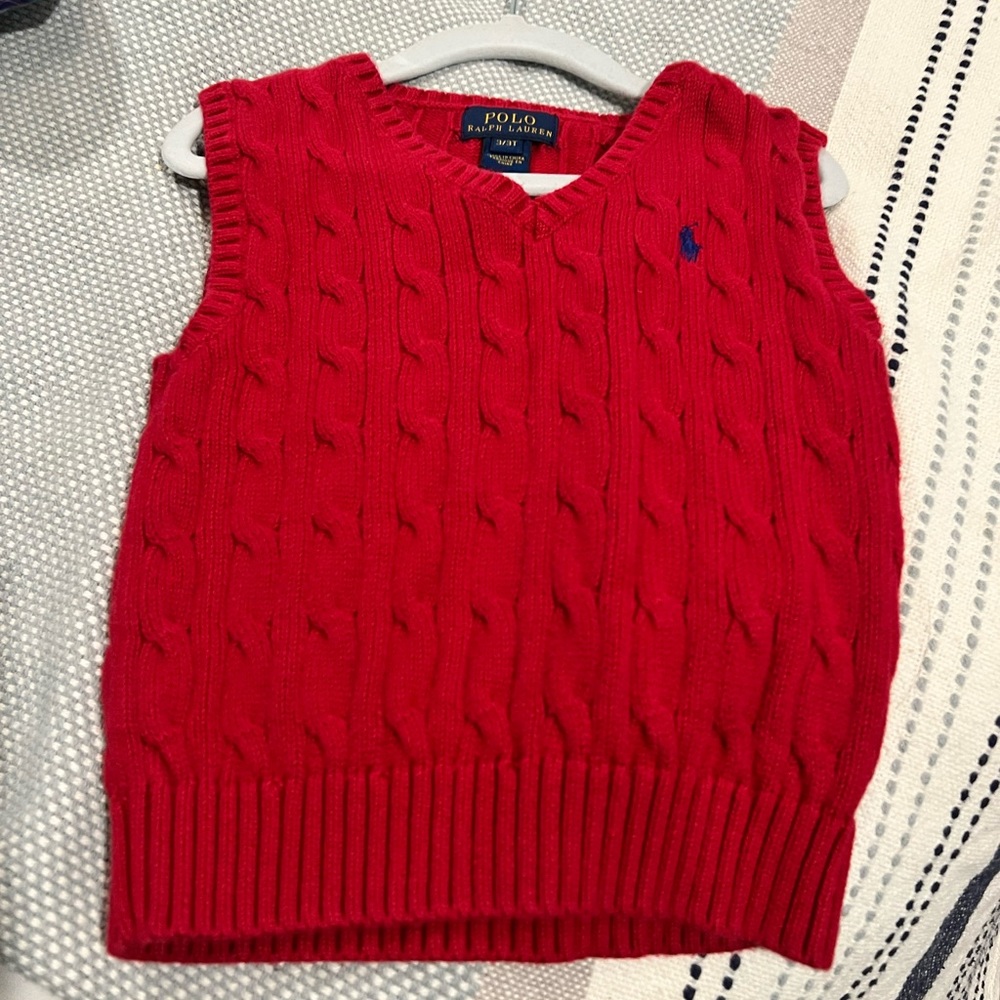 Polo cable knit vest.